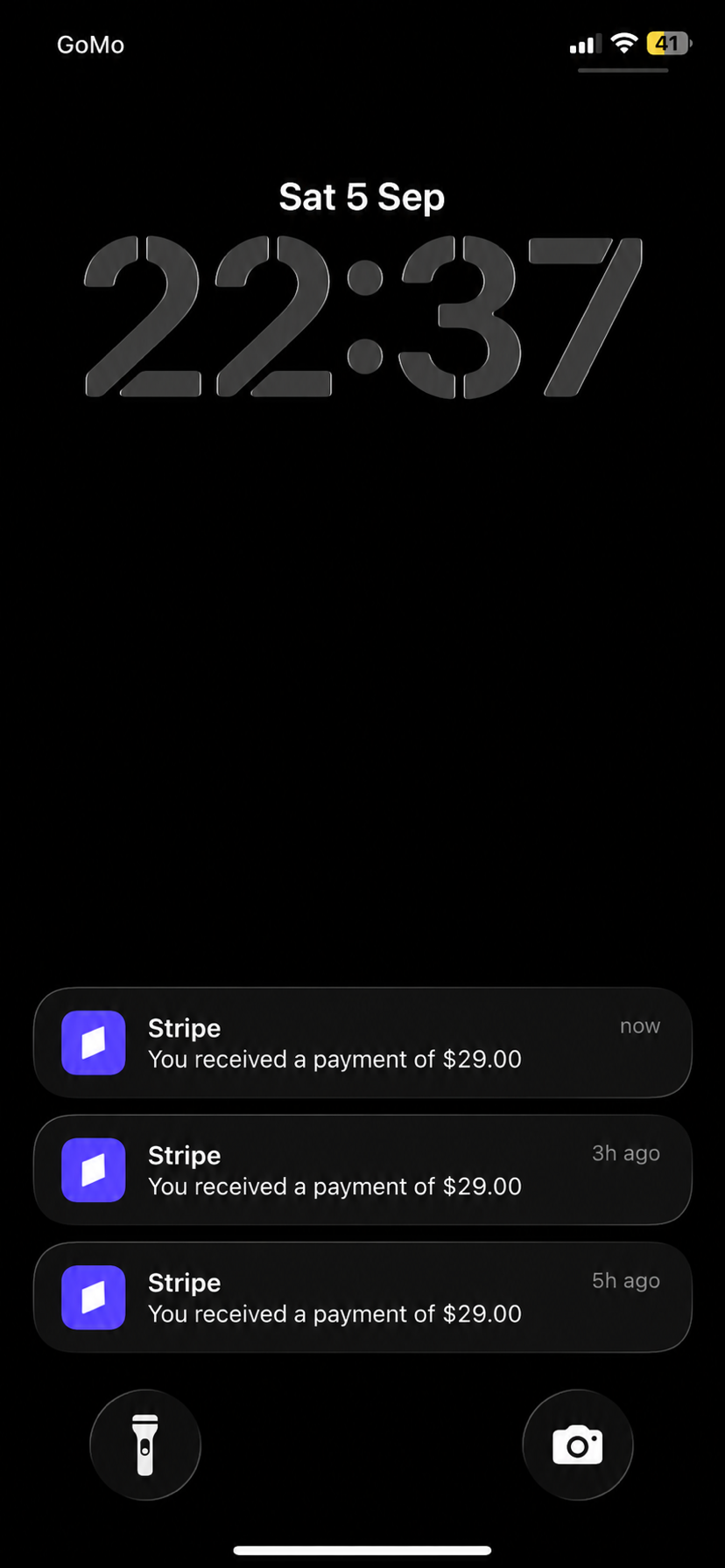 iPhone lock screen showing three Stripe notifications for $29.00 payments received